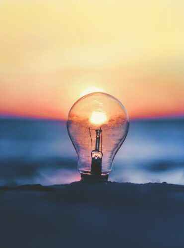 selective focus photography of light bulb