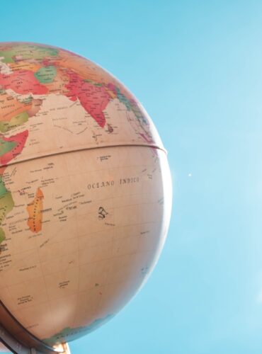 white and red globe under blue sky during daytime