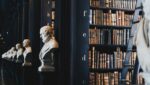 book lot on black wooden shelf